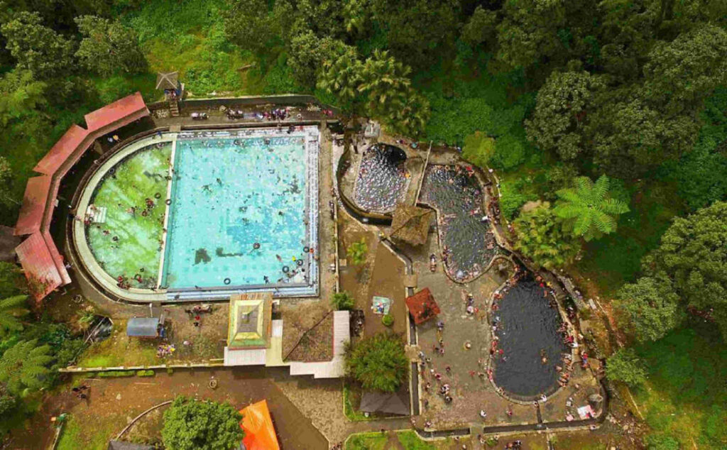 Soaking in Air Panas Cangar is one of the most relaxing things to do in Batu Malang, surrounded by mountain views