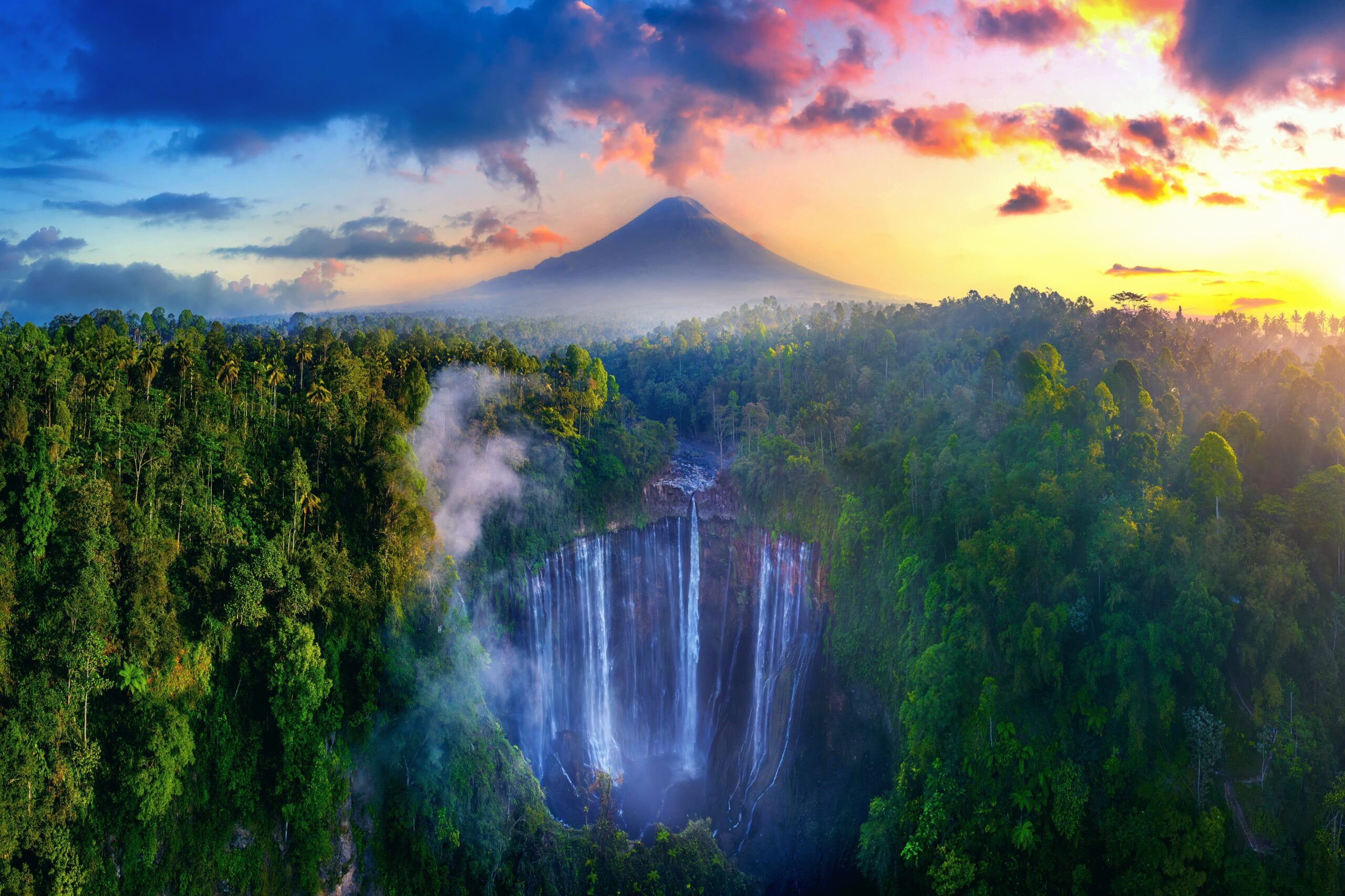 Tumpak,Sewu,Waterfall,And,Semeru,Mountain,At,Sunrise,,Indonesia.